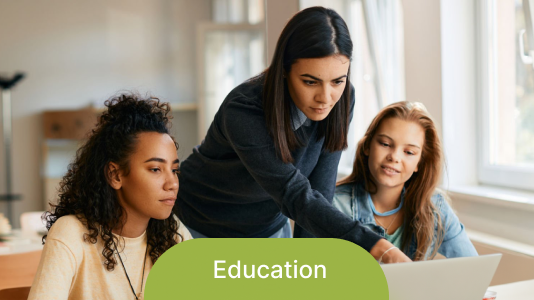 Teacher collaborating with students in an educational setting